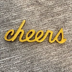 brass word object- Cheers